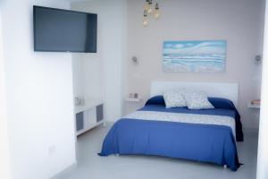 Postel nebo postele na pokoji v ubytování Luna Chiara Home