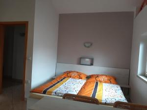 Postel nebo postele na pokoji v ubytování Apartma & RAfting