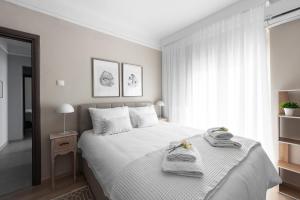 Кровать или кровати в номере #Luxlikehome - Maison Penthouse