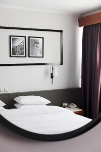 Postel nebo postele na pokoji v ubytování Hotel Z Palace & Congress Center