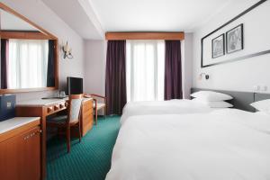 Postel nebo postele na pokoji v ubytování Hotel Z Palace & Congress Center