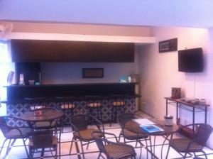 Area lounge atau bar di Panca Dewi Guest House
