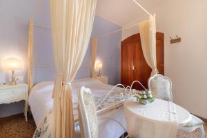 Ein Bett oder Betten in einem Zimmer der Unterkunft La Casa nel Borgo