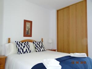 Postel nebo postele na pokoji v ubytování Apartamentos Salceda