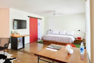 TV a/nebo společenská místnost v ubytování Hotel San Jose
