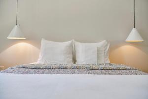 Postel nebo postele na pokoji v ubytování Hotel San Jose