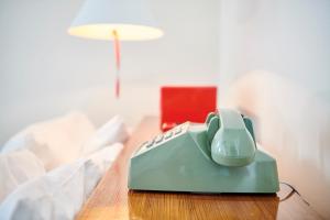 Postel nebo postele na pokoji v ubytování Hotel San Jose