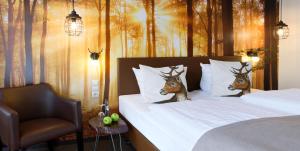 Postel nebo postele na pokoji v ubytování Trend Hotel
