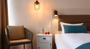 Postel nebo postele na pokoji v ubytování Trend Hotel