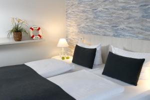 Postel nebo postele na pokoji v ubytování Trend Hotel