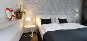 Postel nebo postele na pokoji v ubytování Trend Hotel