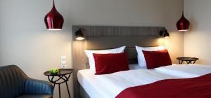 Postel nebo postele na pokoji v ubytování Trend Hotel