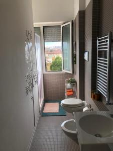 Kúpeľňa v ubytovaní Smart apartment Mare & Movida