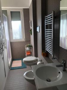 Kúpeľňa v ubytovaní Smart apartment Mare & Movida