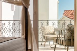 Letto o letti in una camera di Villa Basca