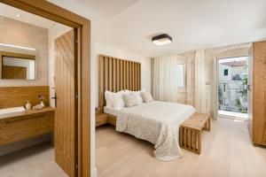 Letto o letti in una camera di Villa Basca