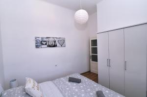Postel nebo postele na pokoji v ubytování Donatella