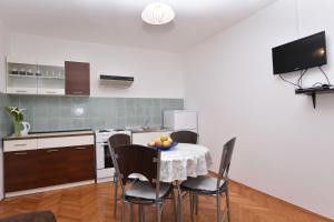 Kuchyň nebo kuchyňský kout v ubytování Apartments Katica
