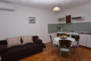 Kuchyň nebo kuchyňský kout v ubytování Apartments Katica