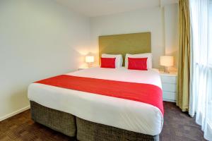 Cama o camas de una habitación en The Quadrant Hotel & Suites