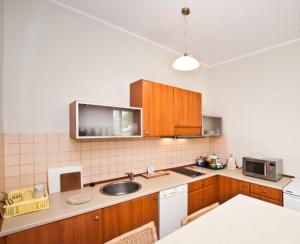 Kuchyňa alebo kuchynka v ubytovaní Apartament w Sercu Starówki