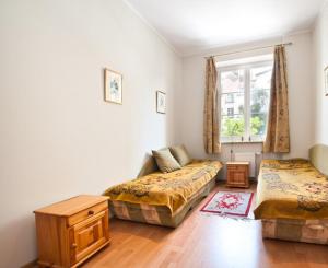 Posedenie v ubytovaní Apartament w Sercu Starówki