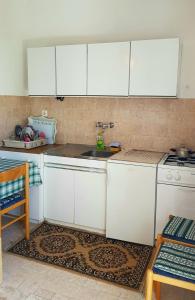 Kuchyňa alebo kuchynka v ubytovaní Apartments Butkovic