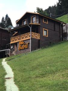 a building with a sign that reads take bath at Ayder Villa Babil in Ayder Yaylasi