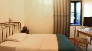 Letto o letti in una camera di Hotel The Lodge Heverlee