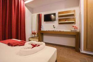 Ένα ή περισσότερα κρεβάτια σε δωμάτιο στο HOTEL MAKARIM TETOUAN