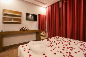 Ένα ή περισσότερα κρεβάτια σε δωμάτιο στο HOTEL MAKARIM TETOUAN