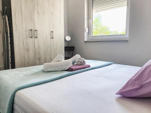 Postel nebo postele na pokoji v ubytování Residence Deja Vu