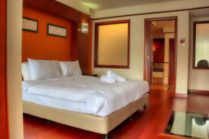 Postel nebo postele na pokoji v ubytování AlexaPD Private Water Chalets + 9 fotografií