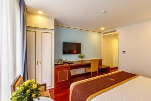 TV a/nebo společenská místnost v ubytování Huong Sen Annex Hotel