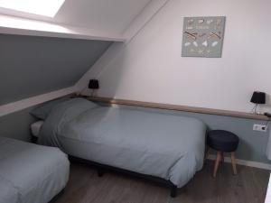 מיטה או מיטות בחדר ב-Veers Vertier