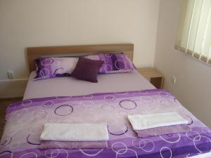 Postel nebo postele na pokoji v ubytování Guest House Konak kod Danke