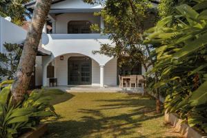 a view of the front yard of a house at Villa Republic, Bentota (06 bedroom) in Bentota