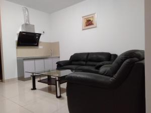 Uma área de estar em Excelsior Resort