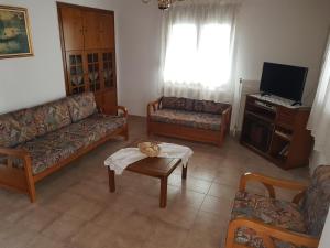 Posezení v ubytování Nikolaos House