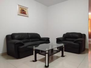 Uma área de estar em Excelsior Resort