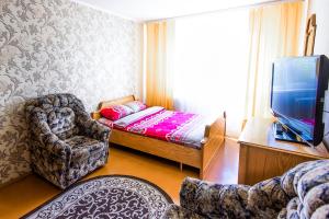 En eller flere senge i et værelse på Квартира на Козлова 13
