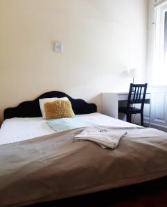 Posteľ alebo postele v izbe v ubytovaní Wesselényi Rooms near Gozsdu Udvar