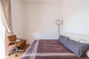 Łóżko lub łóżka w pokoju w obiekcie Finestra sul mare