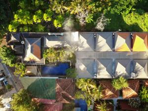 an overhead view of a house with a roof at Vamana Resort - CHSE Certified in Gili Trawangan