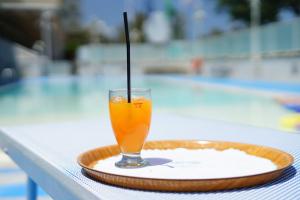 Bazén v ubytování Grand Hotel Excelsior nebo v jeho okolí