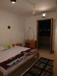 A bed or beds in a room at Adad Noubian House