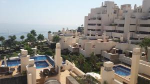 an aerial view of a building and the ocean at 103 - Beach apartment with Spa & Gym in Estepona