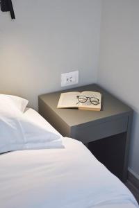 Letto o letti in una camera di Spacious Suite w. huge balcony + Acropolis view