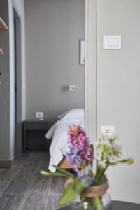 Letto o letti in una camera di Spacious Suite w. huge balcony + Acropolis view