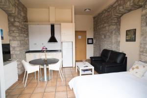 Kuchyňa alebo kuchynka v ubytovaní Urbi Apartments